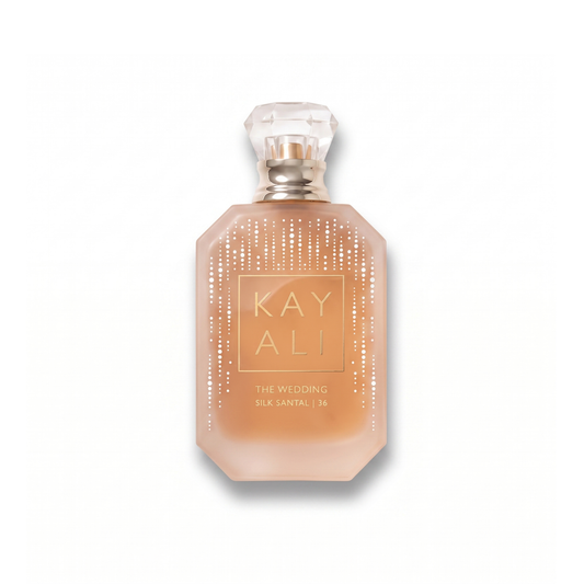 Bottle of Kayali The Wedding Silk Santal | 36 EDP fragrance on a white background with soft shadow