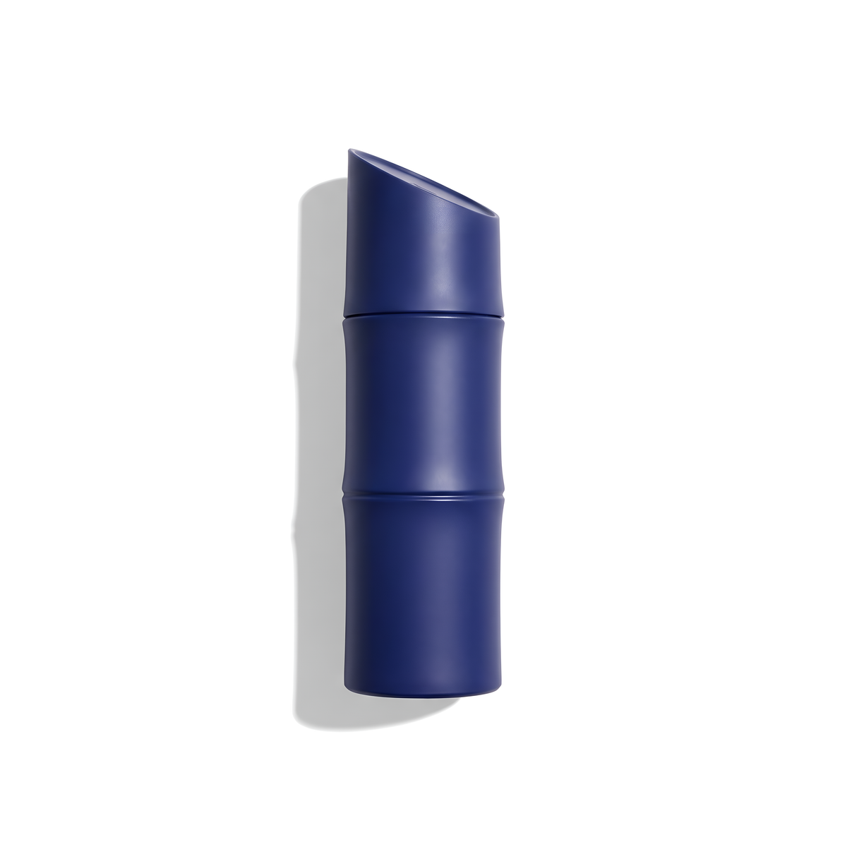 Bottle of Kenzo Homme Indigo EDP fragrance on a white background with soft shadow