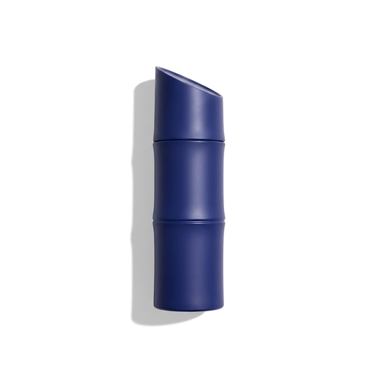 Bottle of Kenzo Homme Indigo EDP fragrance on a white background with soft shadow