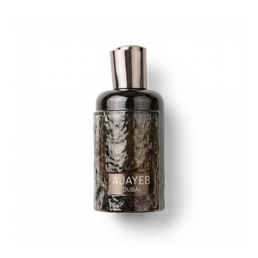 Bottle of Lattafa Ajayeb Dubai EDP fragrance on a white background with soft shadow