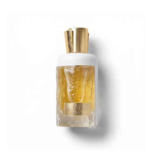Bottle of Lattafa Ajayeb Dubai Portrait EDP fragrance on a white background with soft shadow