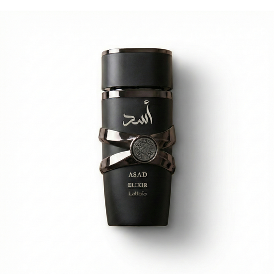 Bottle of Lattafa Asad Elixir fragrance on a white background with soft shadow
