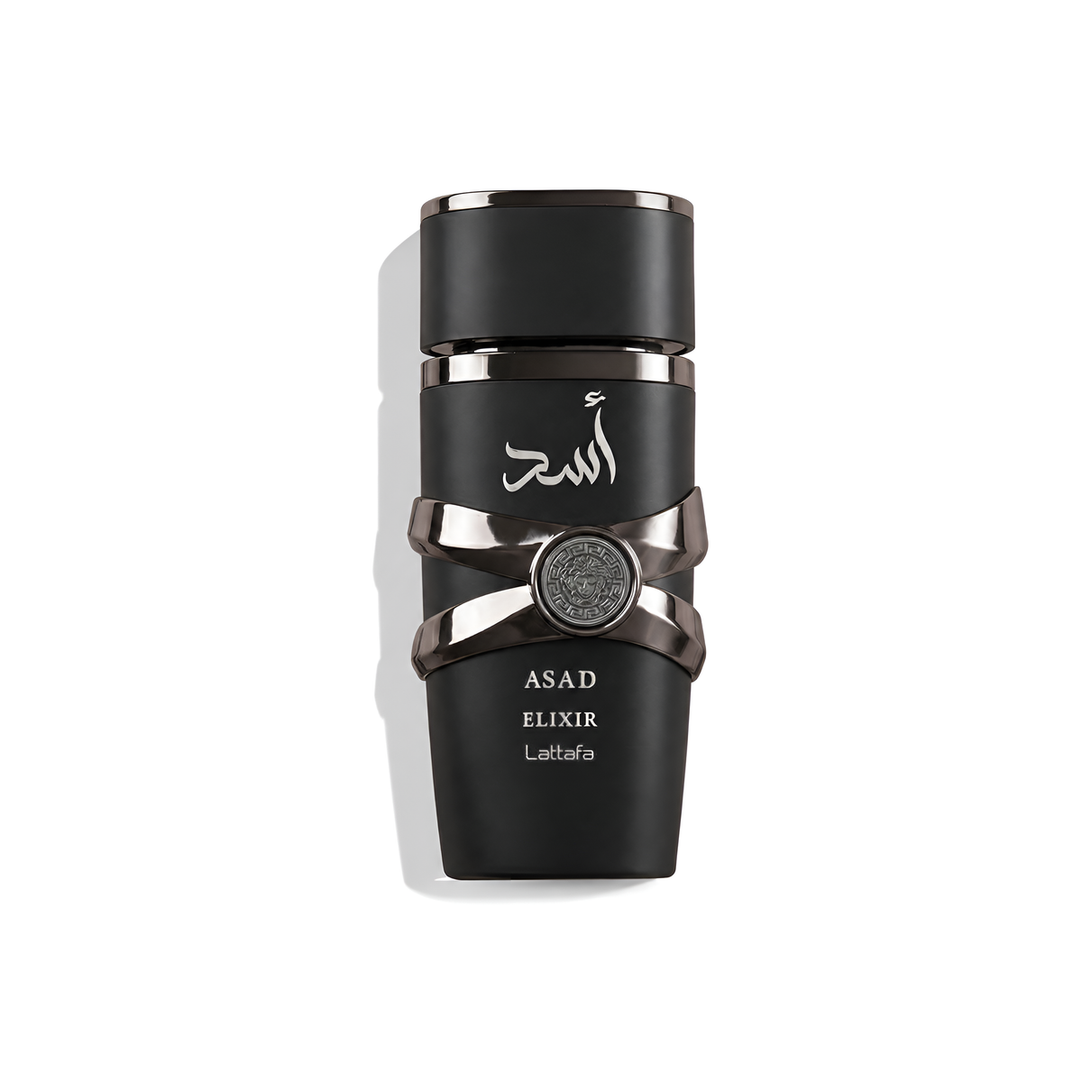 Bottle of Lattafa Asad Elixir fragrance on a white background with soft shadow