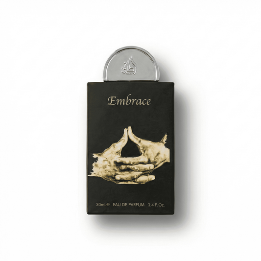 Bottle of Lattafa Embrace EDP fragrance on a white background with soft shadow