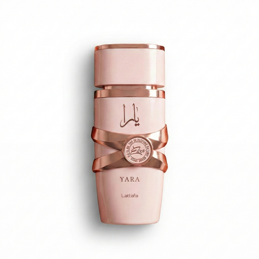 Bottle of Lattafa Yara Elixir EDP fragrance on a white background with soft shadow
