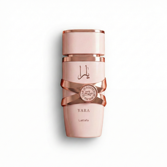 Bottle of Lattafa Yara Elixir fragrance on a white background with soft shadow