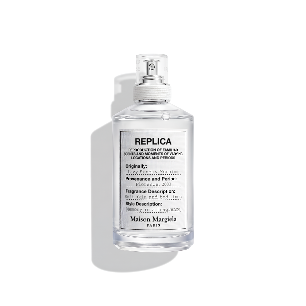 Bottle of Margiela Lazy Sunday Morning EDT fragrance on a white background with soft shadow