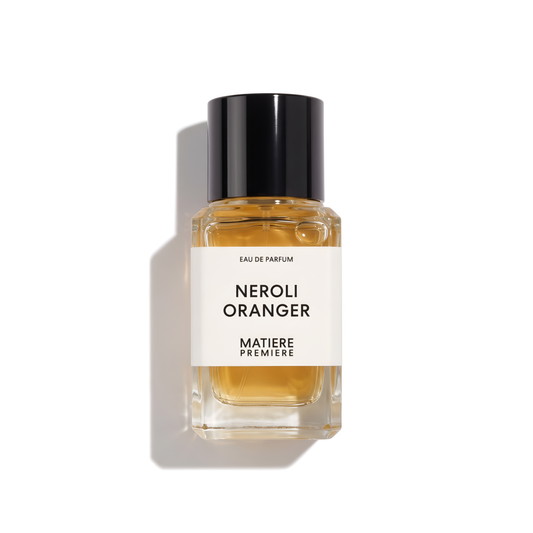 Bottle of Matiere Premiere Neroli Oranger EDP fragrance on a white background with soft shadow