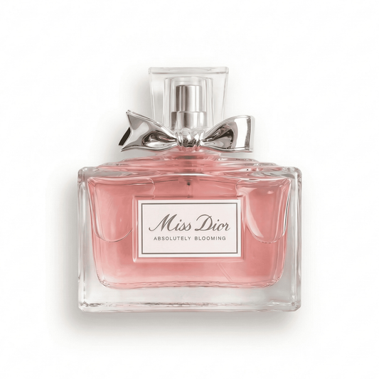 Bottle of Miss Dior Absolutely Blooming EDP fragrance on a white background with soft shadow