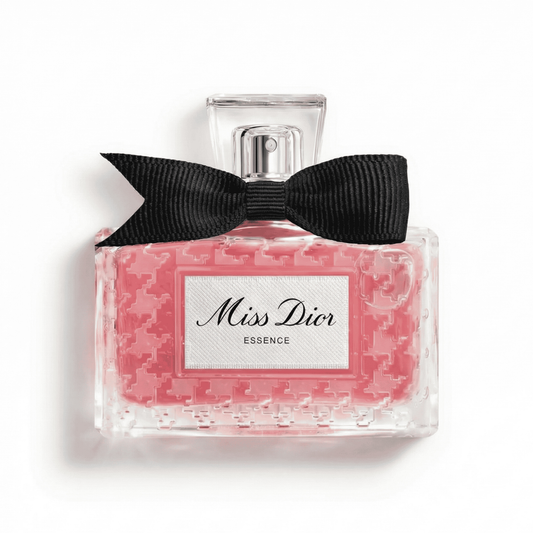 Bottle of Miss Dior Essence EDP fragrance on a white background with soft shadow