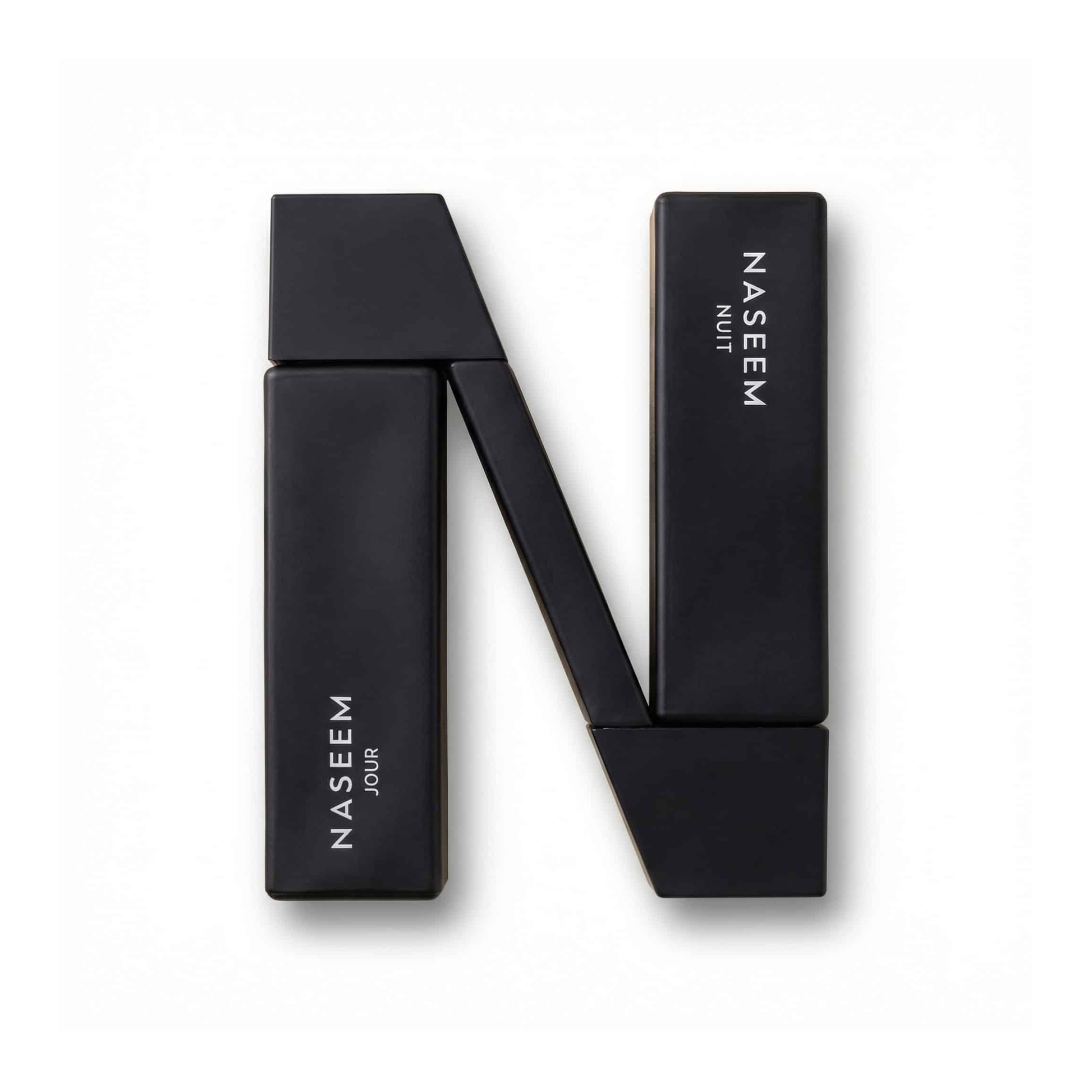 Bottle of Naseem Nuit & Jour Parfum fragrance on a white background with soft shadow