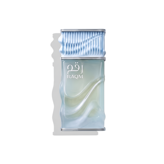 Bottle of Nusuk Raqm Extrait fragrance on a white background with soft shadow