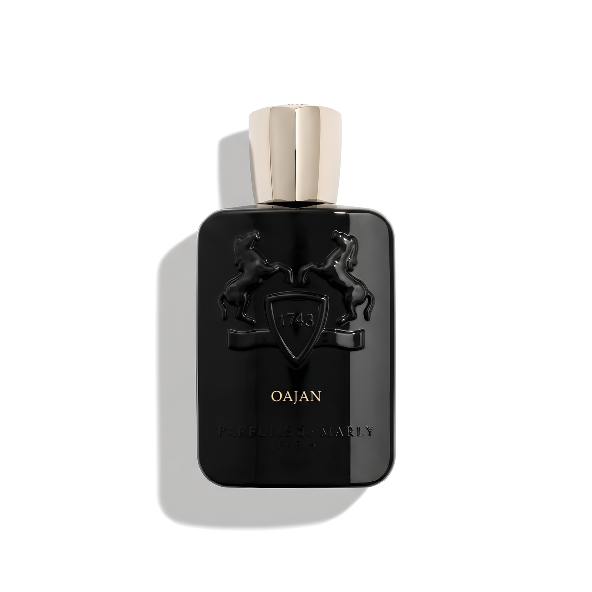 Bottle of Parfums de Marly Oajan EDP fragrance on a white background with soft shadow