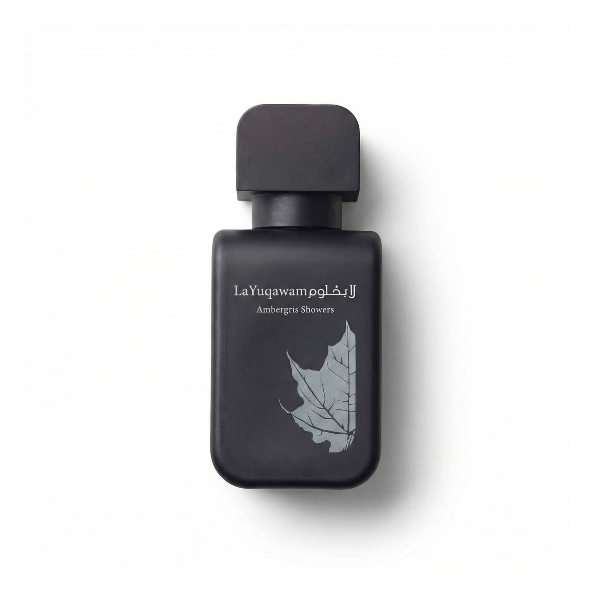 Bottle of Rasasi La Yuqawam Ambergris Showers EDP fragrance on a white background with soft shadow