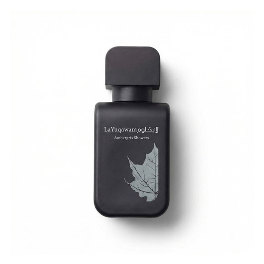 Bottle of Rasasi La Yuqawam Ambergris Showers EDP fragrance on a white background with soft shadow