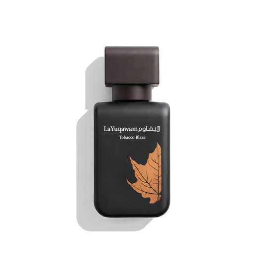 Bottle of Rasasi La Yuqawam Tobacco Blaze EDP fragrance on a white background with soft shadow