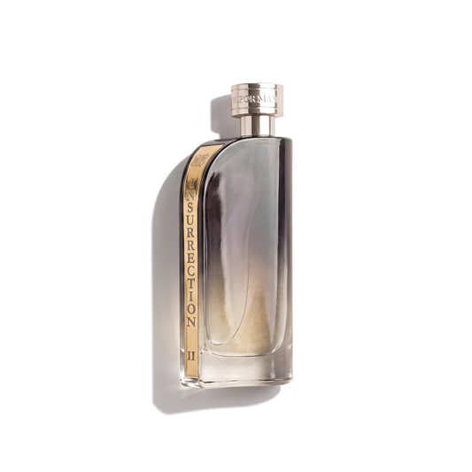 Bottle of Reyane Insurrection II Wild EDT fragrance on a white background with soft shadow