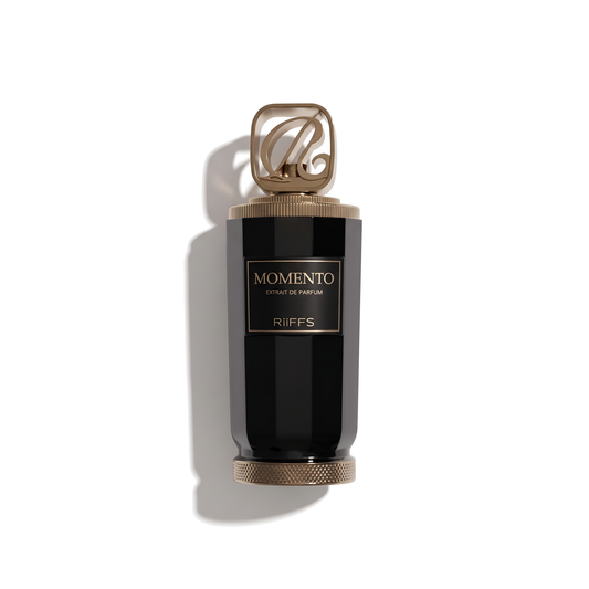 Bottle of Riffs Momento Extrait fragrance on a white background with soft shadow