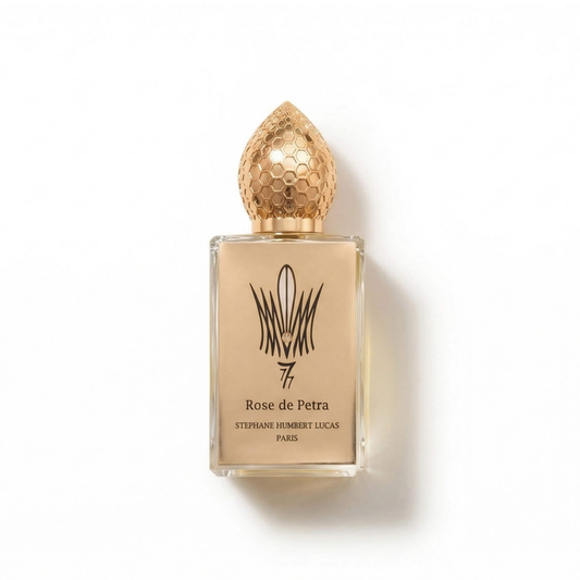 Bottle of SHL 777 Rose De Petra EDP fragrance on a white background with soft shadow