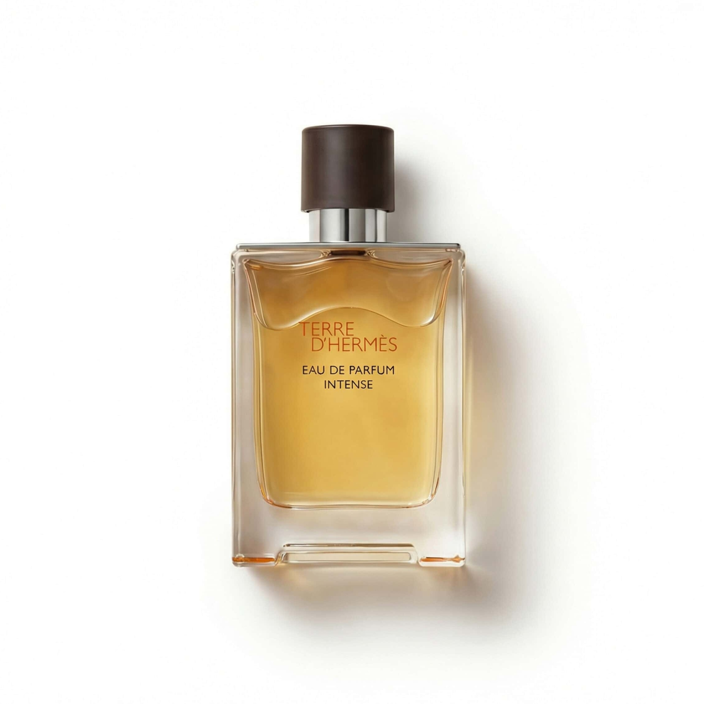 Bottle of Terre D'Hermes Eau de Parfum Intense fragrance on a white background with soft shadow