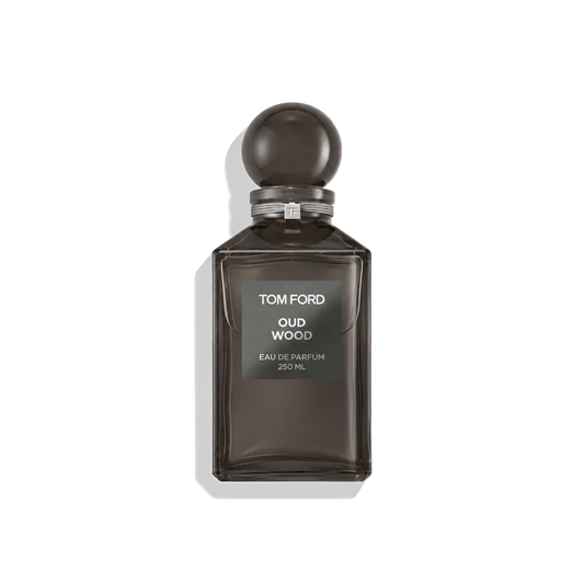 Bottle of Tom Ford Oud Wood EDP fragrance on a white background with soft shadow