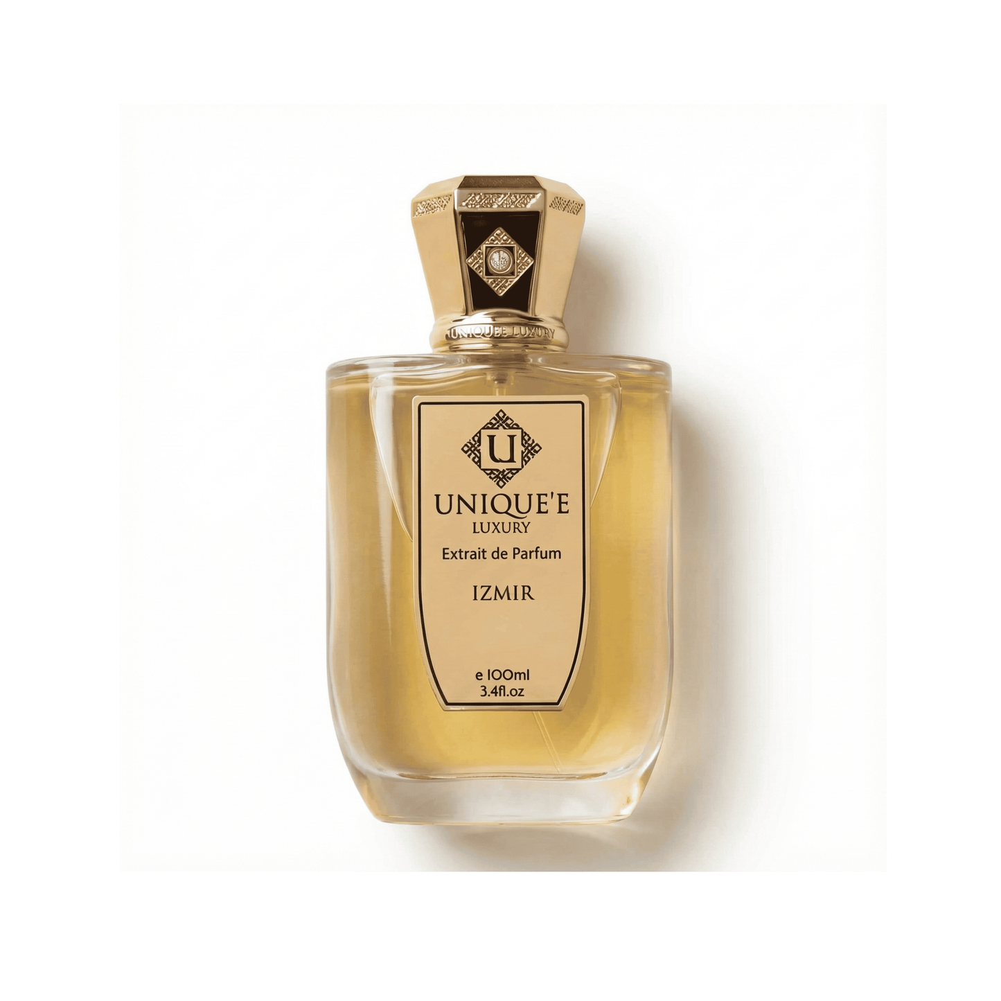 Bottle of Unique'E Luxury Izmir Extrait fragrance on a white background with soft shadow