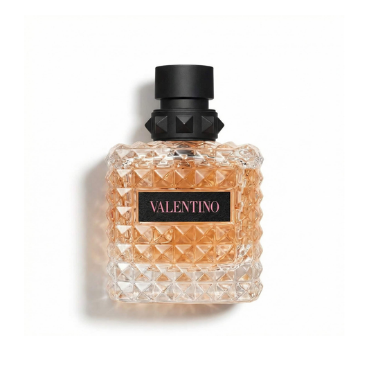 Bottle of Valentino Donna Born In Roma Coral Fantasy EDP fragrance on a white background with soft shadow