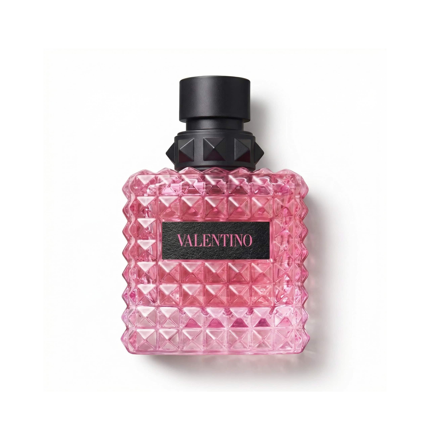 Bottle of Valentino Donna Born In Roma Extradose Parfum fragrance on a white background with soft shadow
