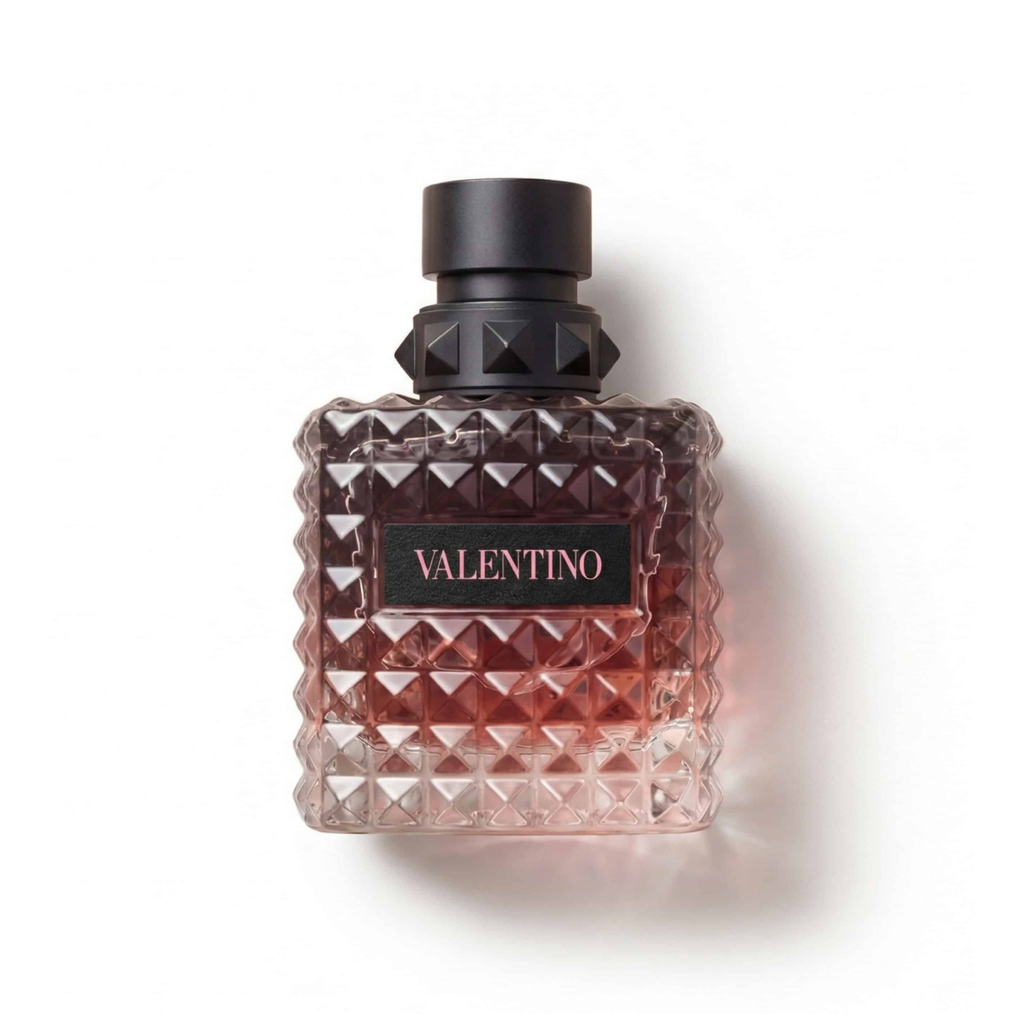Bottle of Valentino Donna Born In Roma Intense EDP fragrance on a white background with soft shadow