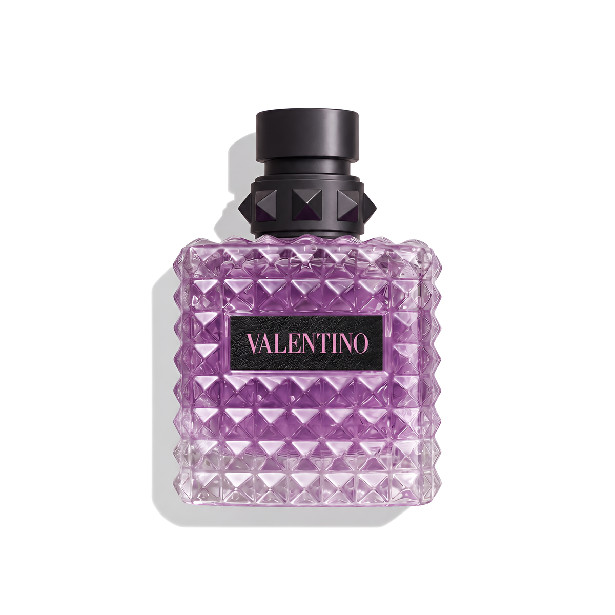 Bottle of Valentino Donna Born in Roma Purple Melancholia EDP fragrance on a white background with soft shadow