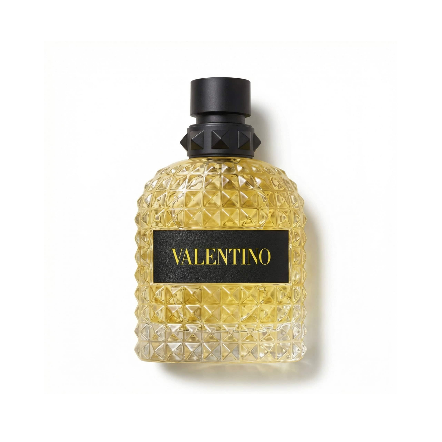 Bottle of Valentino Uomo Born In Roma Yellow Dream EDT fragrance on a white background with soft shadow