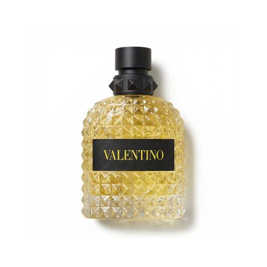 Bottle of Valentino Uomo Born In Roma Yellow Dream EDT fragrance on a white background with soft shadow