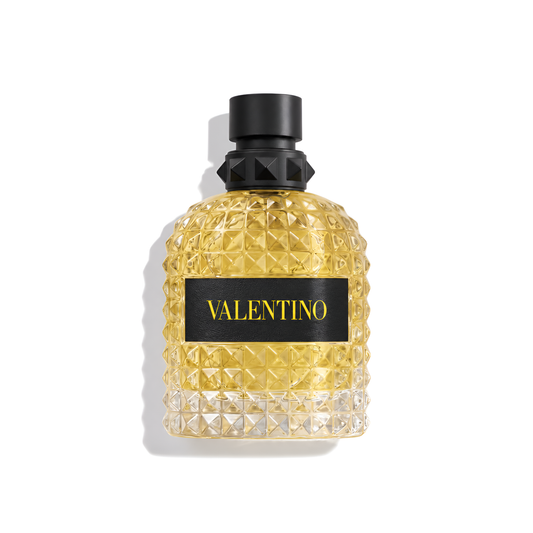 Bottle of Valentino Uomo Born In Roma Yellow Dream EDT fragrance on a white background with soft shadow