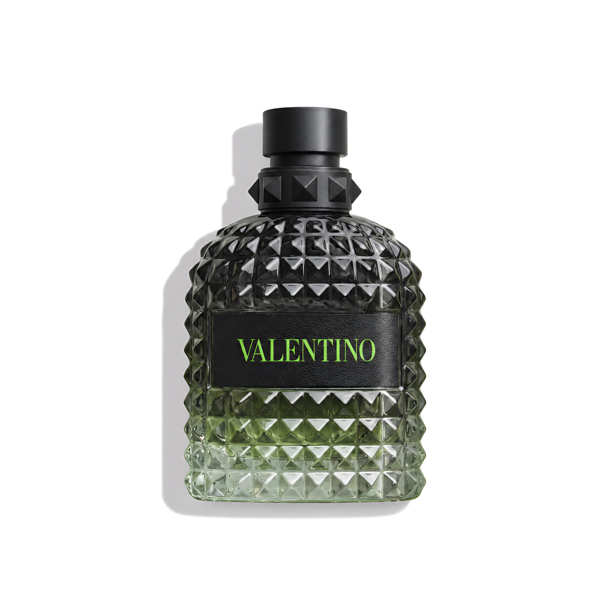 Bottle of Valentino Uomo Born in Roma Green Stravaganza EDT fragrance on a white background with soft shadow