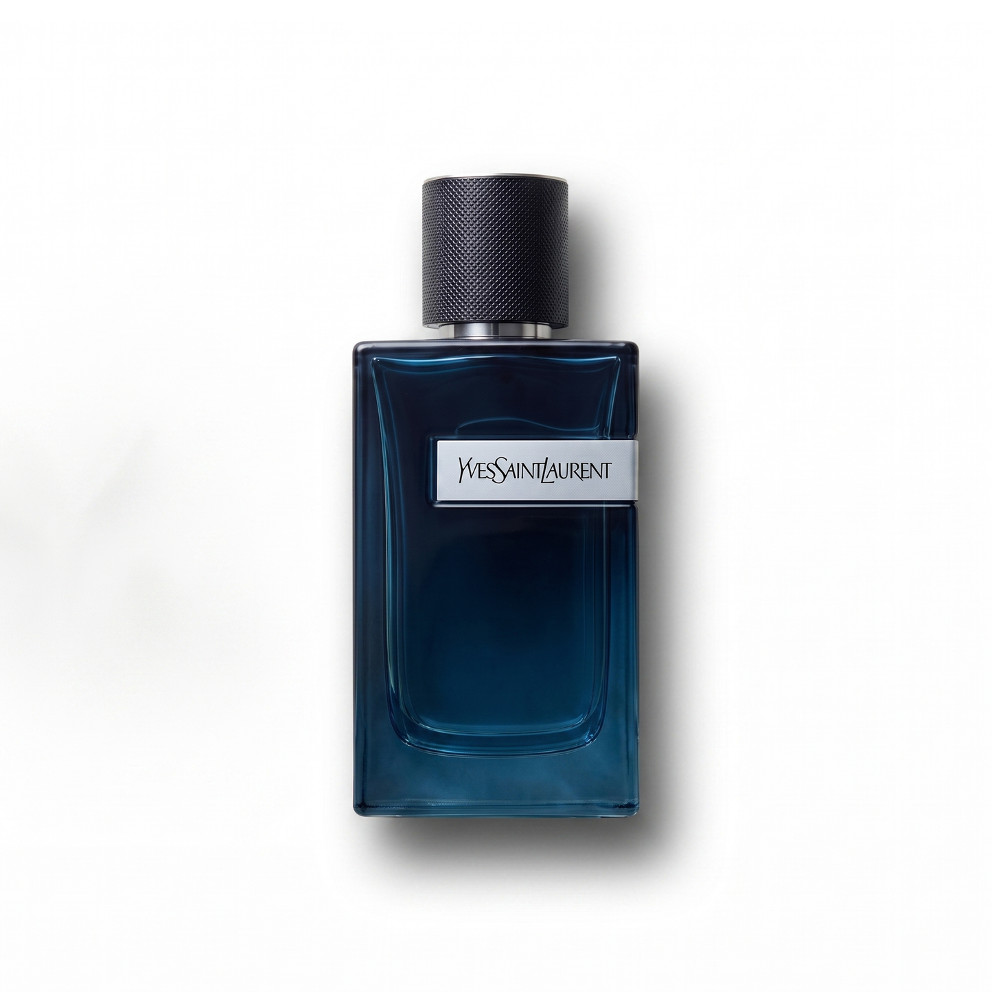 Bottle of YSL Y Eau de Parfum Intense fragrance on a white background with soft shadow