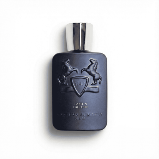 Luxurious men's fragrance bottle with embossed emblem and sleek black design.
