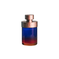 A 100ml bottle of Halloween Man Hero Eau de Toilette, featuring a sleek, dark blue glass body with a silver metallic cap and a blue liquid, placed on a brown table.