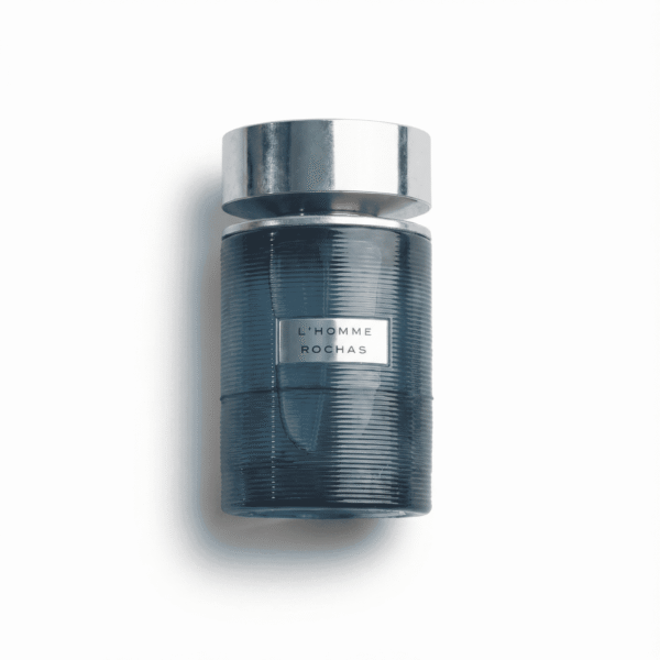 Luxurious men's fragrance bottle L'Homme Rochas, elegant design, modern scent, perfect for refined style.