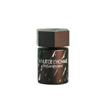 a 100ml bottle of Yves Saint Laurent La Nuit de l’Homme Collector’s Edition Eau de Toilette (2014) with a sleek, dark grey cylindrical glass design featuring a textured pattern and a black cap on a brown table