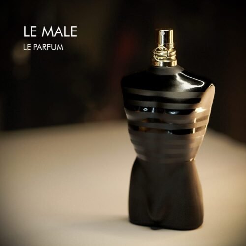 A 100ml bottle of Jean Paul Gaultier Le Male Le Parfum with a black torso-shaped design on a white bottle