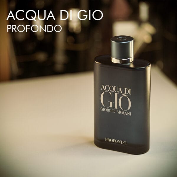 A 100ml bottle of Giorgio Armani Acqua Di Gio Profondo Eau de Parfum with a blue glass bottle, a blue cap, and sleek lines, placed on a white table.