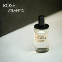 A clear bottle of D.S. And Durga Rose Atlantic Eau De Parfum with black font labels.