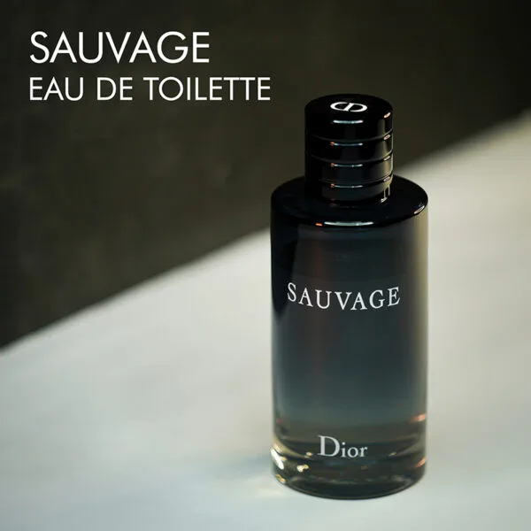 A dark tinted bottle of Dior Sauvage Eau de Toilette with white font labels.