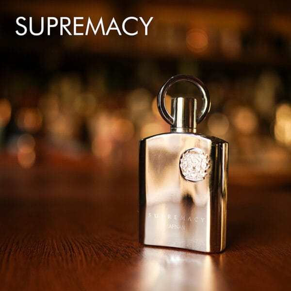 A 100ml bottle of Afnan Supremacy Eau de Parfum with a sleek silver design on a white table