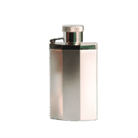A 100ml bottle of Dunhill Desire Platinum Eau de Toilette with a silver metallic bottle and metallic silver cap on a brown table.