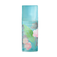 a 100ml bottle of Elizabeth Arden Green Tea Sakura Blossom Eau de Toilette with a greenish glass design and greenish cap on a brown table.