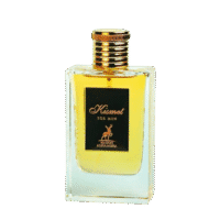 a 100ml bottle of Maison Alhambra Kismet for Men Eau de Parfum with a clear glass design and gold cap and black label on a brown table.