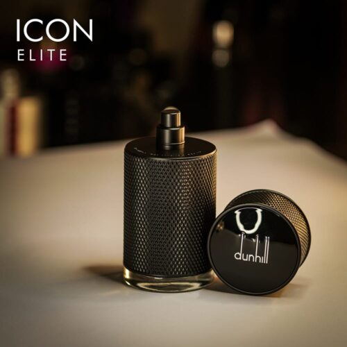 a 100ml bottle of Dunhill Icon Elite Eau de Parfum with a sleek black glass design featuring textured silver detailing and a black cap on a brown table.