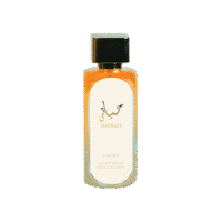 a 100ml bottle of Lattafa Hayaati Gold Elixir Eau de Parfum with a white textured glass design and a black cap on a brown table