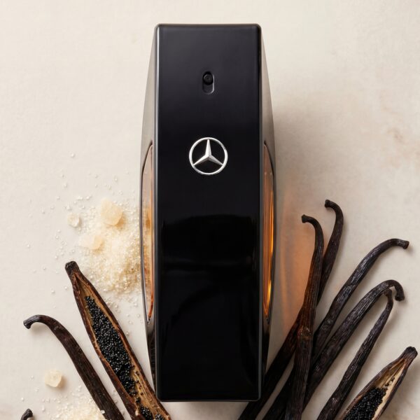 Singles (18) Sleek Mercedes-Benz perfume atomizer surrounded by vanilla pods and vanilla beans on a neutral background.